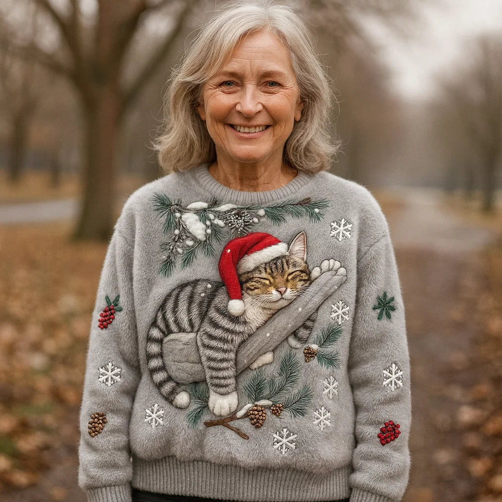 Elena – Kersttrui met slapende kat en wintertakken